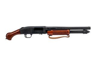 Mossberg 590 Night Stick 6-shot 12-gauge firearm with Raptor grip and wood furniture.